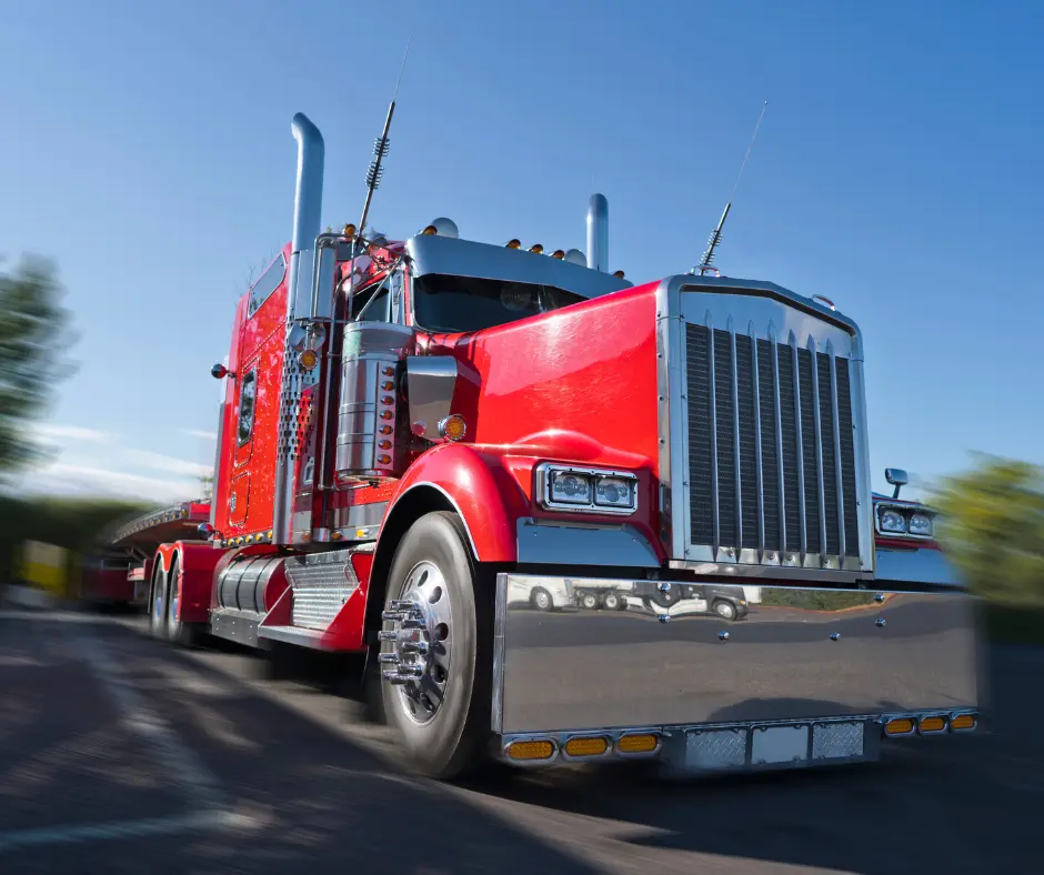 Red semi-truck on highway